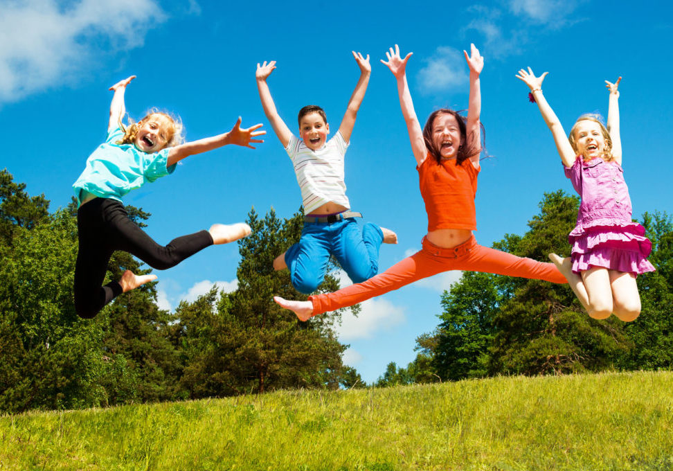 Happy active children jumping